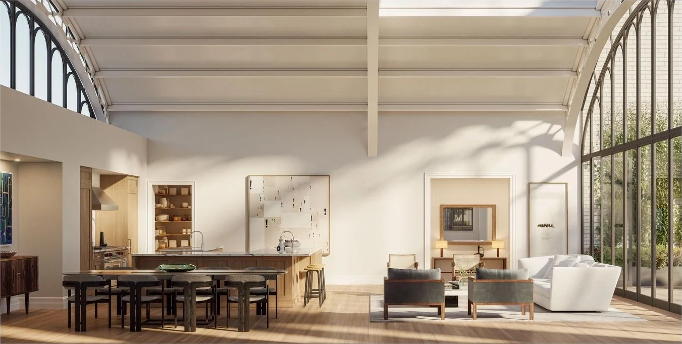 Open living and dining room beneath a vaulted ceiling with floor-to-ceiling arched windows